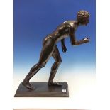 AFTER THE ANTIQUE, A BRONZE FIGURE OF AN ATHLETE. H.54cms.