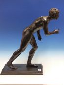 AFTER THE ANTIQUE, A BRONZE FIGURE OF AN ATHLETE. H.54cms.