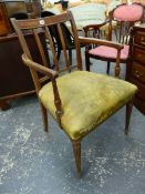 A 19th C. MAHOGANY ELBOW CHAIR WITH REEDED THREE BAR BACK, THE STUFFED SEAT ABOVE REEDED TAPERING