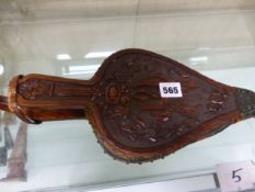 A SET OF EDWARDIAN CARVED OAK FIRESIDE BELLOWS DATED 1905.