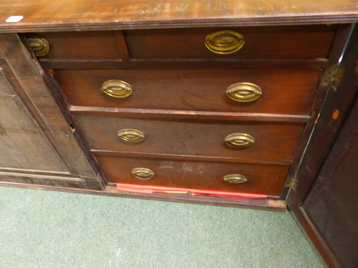 AN UNUSUAL INLAID MAHOGANY REGENCY CUPBOARD/ CHEST WITH TWO PANEL DOORS ENCLOSING NINE DRAWERS. W. - Image 7 of 10
