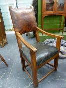 A LEATHER UPHOLSTERED WALNUT ELBOW CHAIR, THE SQUARE LEGS JOINED BY STRETCHERS.