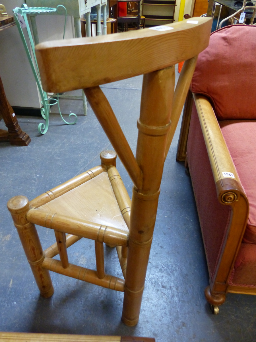 A PINE TURNER'S CHAIR, THE BOWED TOP RAIL ON TURNED COLUMN ABOVE THE TRIANGULAR SEAT. - Image 2 of 3