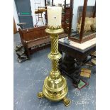A 1902 MEMORIAL LARGE BRASS FLOOR STANDING CANDLESTICK, THE GALLERIED TOP ON KNOPPED SPIRAL TURNED
