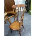 THREE SIMILAR ELM STICK BACK ELBOW CHAIRS, THE BROAD TOP RAILS OVER FIVE BAR BACKS, SADDLE SEATS AND