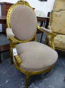 A PAIR OF LOUIS XVI STYLE GILT SHOW FRAME LARGE SALON ARMCHAIRS. (2)