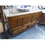 AN OAK MULE CHEST, THE THREE PANEL FRONT ABOVE TWO DRAWERS AND THE STILE FEET. W 127 x D 49 x H