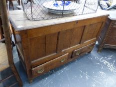 AN OAK MULE CHEST, THE THREE PANEL FRONT ABOVE TWO DRAWERS AND THE STILE FEET. W 127 x D 49 x H