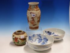 A JAPANESE SATSUMA VASE PAINTED WITH TWO PANELS OF DIGNITARIES. H 24cms. TWO ARITA BLUE AND WHITE