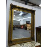 AN IMPRESSIVE GILT FRAMED MIRROR. 154 x 124cms.