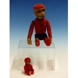 A SHUCO MINIATURE SCENT BOTTLE CHIMPANZEE AND A LARGER SIMILAR TOY IN BELL BOY UNIFORM.