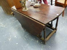 AN 18th.C.OAK GATELEG TABLE ON TURNED LEGS AND SRETCHERS. 137 x 177 x H.71cms.