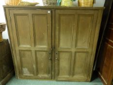 A LARGE ANTIQUE PAINTED PINE ARCHITECTURAL PANEL DOOR CUPBOARD WITH SHELVED INTERIOR. W.168 x H.