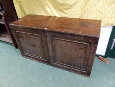 AN UNUSUAL INLAID MAHOGANY REGENCY CUPBOARD/ CHEST WITH TWO PANEL DOORS ENCLOSING NINE DRAWERS. W.