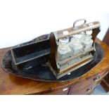 A VICTORIAN THREE BOTTLE TANTALUS, A SHAPED PAPIER MACHE TRAY AND AN ORIENTAL WOODEN BOX. (3)