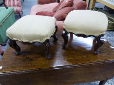 A PAIR OF VICTORIAN SMALL FOOTSTOOLS ON SHORT CABRIOLE LEGS. 31 x 31 x H.24cms.