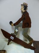 A PAINTED IRON WEATHER VANE, THE SHEET CUT OUT TO REPRESENT A MAN PLAYING BOWLS. 40 x 36cms.