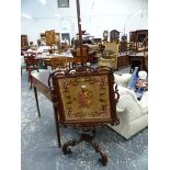 A VICTORIAN ROSEWOOD FRAMED BEADWORK PANEL POLE SCREEN ON TRIPOD BASE.