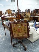 A VICTORIAN ROSEWOOD FRAMED BEADWORK PANEL POLE SCREEN ON TRIPOD BASE.