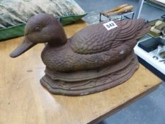 A CAST IRON DUCK FORM DOOR STOP.