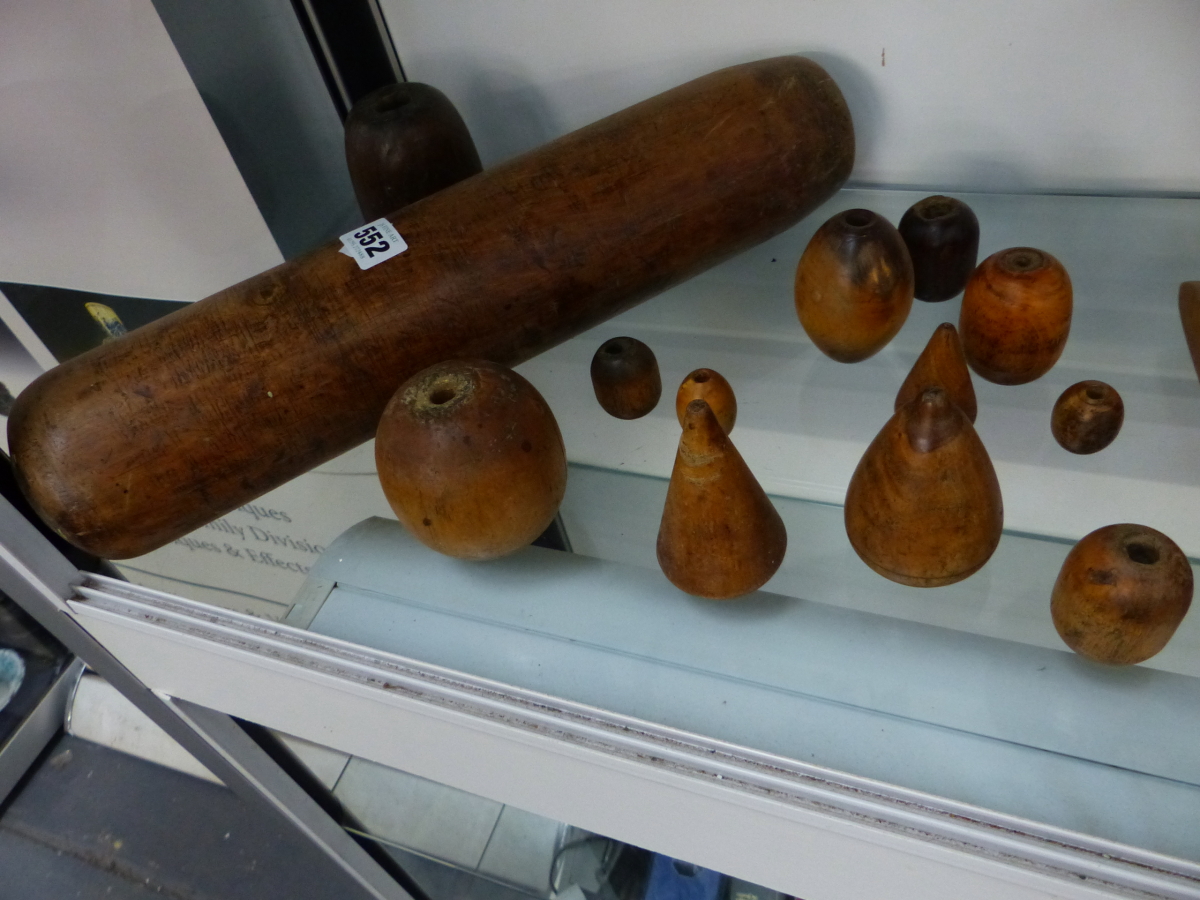 A COLLECTION OF TWENTY WOODEN TOOLS FOR THE LEAD WORKER AND PLUMBER.