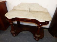 A VICTORIAN MAHOGANY MARBLE TOP WASHSTAND ON TURNED CARVED SUPPORTS WITH PLATFORM UNDERTIER. W.113 x