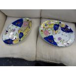 A PAIR OF OVAL PORCELAIN PLATTERS PAINTED WITH A TOBACCO LEAF PATTERN. W 50cms.