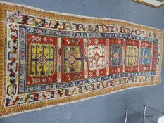 AN ANTIQUE CAUCASIAN RUG OF UNUSUAL DESIGN. 260 x 98cms.