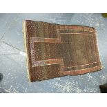 A TRIBAL BELOUCH PRAYER RUG. 125 x 76cms.