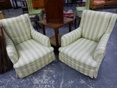 A PAIR OF VICTORIAN HOWARD STYLE LOW FIRESIDE ARMCHAIRS. (2)