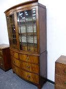 A 19th.C.MAHOGANY BOW FRONT DISPLAY CABINET, THE DOORS GLAZED WITH RECTANGULAR PANELS AND