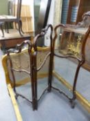 A CARVED MAHOGANY EDWARDIAN GLAZED THREE FOLD FLOOR SCREEN WITH UNUSUAL GILT DECORATION. H.142cms.