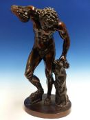 AFTER THE ANTIQUE A GRAND TOUR BRONZE FIGURE OF A NAKED MAN DANCING WHILE PLAYING CYMBALS. H.50cms.