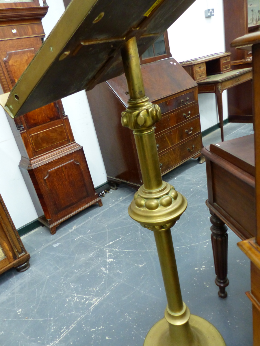 AN EDWARDIAN BRASS LECTERN ON PAW FEET. H.140cms. - Image 2 of 2
