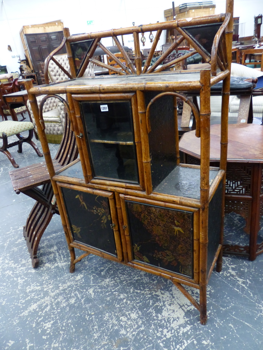A VICTORIAN BAMBOO SIDE CABINET WITH SINGLE GLAZED DOOR OVER LACQUER PANEL DOORS. 78 x 32 x H.