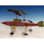 FOUR FISH FORM ICE FISHING LURES, ONE BY LYLE CHEVI. W 18.5cms. ANOTHER BY JAMES HOYLAND. W 16.5cms.