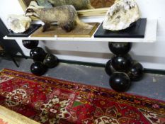 A BESPOKE RECTANGULAR WHITE MARBLE TOPPED PIER TABLE, EACH NARROW END SUPPORTED ON STACKS OF FIVE