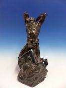 ALFREDO PINA. (1893-1966) A BRONZE FIGURE OF THE PRODIGAL SON KNEELING ON A ROCK AND STRETCHING BACK