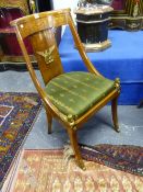 A PAIR OF FRENCH EMPIRE STYLE CHAIRS WITH EGYPTIAN STYLE ORMOLU MOUNTS.