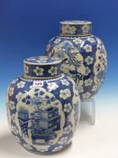 A PAIR OF CHINESE BLUE AND WHITE JARS AND COVERS, EACH PAINTED WITH FOUR RESERVES OF PRECIOUS