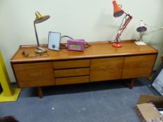 A RETRO TEAK SIDEBOARD.