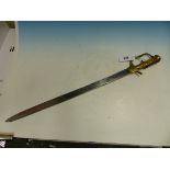 A BRASS HILTED SWORD BAYONET FOR A MILITARY RIFLE, BLADE LENGTH 22".