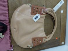 A RADLEY PALE TERRACOTTA LEATHER HANDBAG, THE DARKER CORNERS APPLIED TO ONE SIDE SEWN WITH BEADED