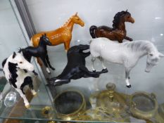 SIX VARIOUS BESWICK HORSE FIGURES, A DOULTON BALLOON MAN FIGURE, A DOULTON PENNY FARTHING FIGURE,