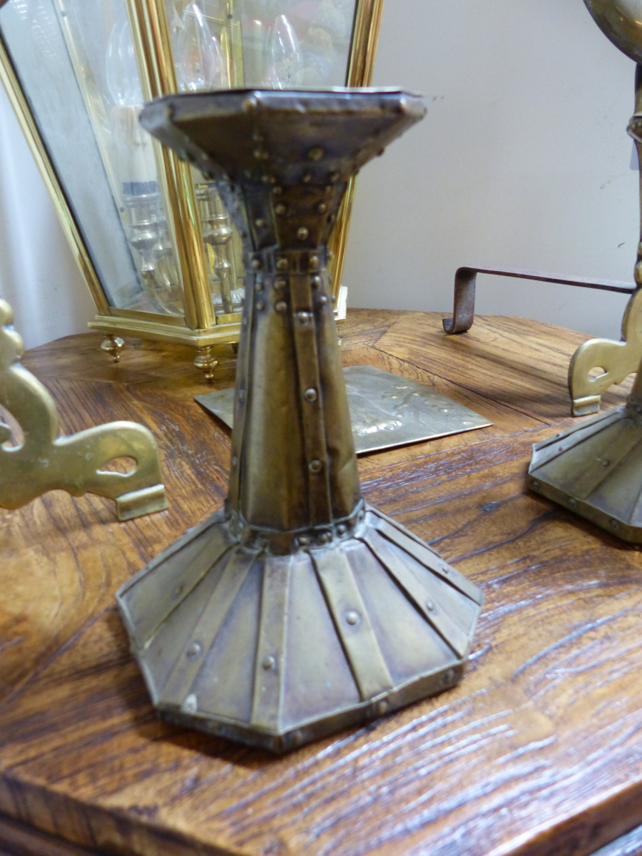 A PAIR OF ARTS AND CRAFTS CANDLESTICKS AND AN EMBOSSED BRASS PANEL. - Image 3 of 4