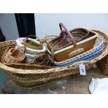 A LARGE COLLECTION OF VARIOUS BASKETS OF DIFFERENT SIZES AND SHAPES.