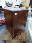 A VICTORIAN SMALL COLLECTOR'S CABINET WITH SINGLE PANEL DOOR ENCLOSING THREE DEEP DIVIDED DRAWERS.