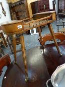 A YEW WOOD TRIPOD TABLE WITH A LIDDED BOX TO ONE SIDE OF THE WAVY GALLERIED CIRCULAR TOP. Dia. 36.5