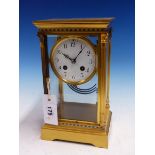 A FRENCH GILT METAL MOUNTED BEVELLED GLASS CASED MANTLE CLOCK STRIKING ON A COILED ROD, THE