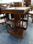 AN EDWARDIAN REVOLVING BOOKCASE. 53 x 53 c H.82cms.